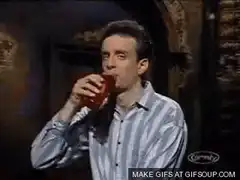 Jerry Seinfeld sprays drink