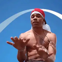 shirtless man gesturing with hands
