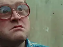 Man with glasses blinking