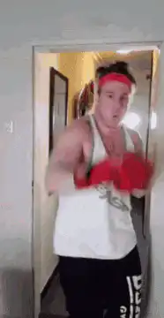 Man in boxing gloves shadow boxing