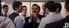 Leonardo DiCaprio singing into a microphone