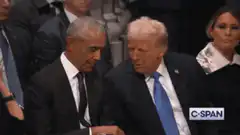 Obama and Trump talking at a debate