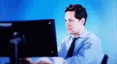 Andy Bernard desk spins and says I'm okay
