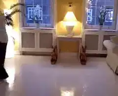 man dancing with rabbit figurines