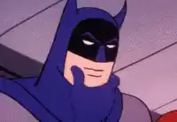 Batman thinking with hand on chin