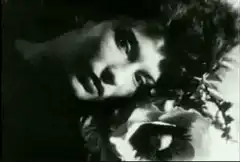 woman resting head on hand