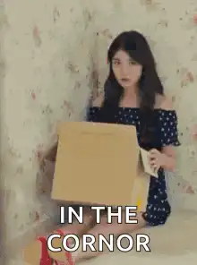 Girl hiding in a box