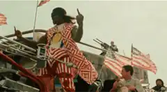 Uncle Sam dancing on a float
