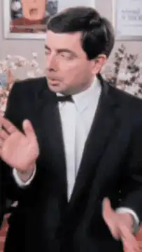 Mr. Bean confused by his watch