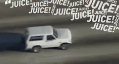 white car driving with juice text