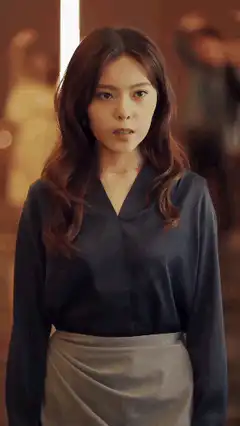Woman watches men walk past