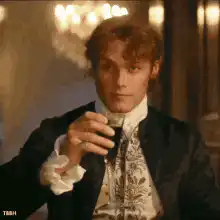 Mr. Darcy raises a glass