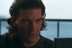 Antonio Banderas kissing his own knuckles