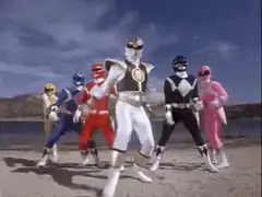 Power Rangers pose on beach