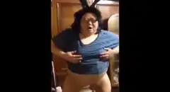 Woman in bunny ears dancing