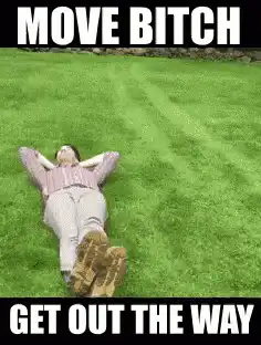 Woman lying on grass run over by toy car