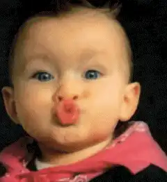Baby making a kissy face