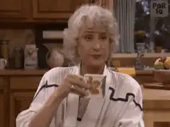 Barbara Stanwyck sips tea