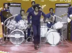 James Brown dancing on stage