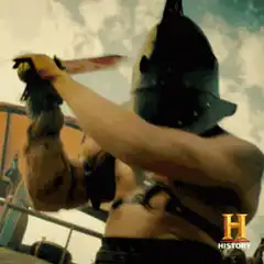 Spartacus cuts off a chicken head
