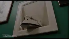 Iron falls through ceiling vent