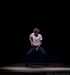 Keanu Reeves as Kimo dancing on stage