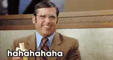 Ron Burgundy laughing with banana