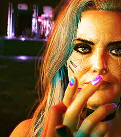 Woman with blue hair and neon nails