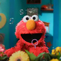 Elmo blowing bubbles