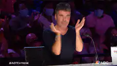 Simon Cowell clapping