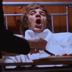 Malcolm McDowell being force-fed