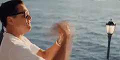 Leonardo DiCaprio counting money