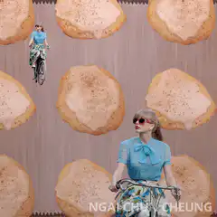 Taylor Swift riding a bike among cookies