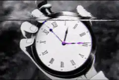 Hand holding stopwatch with glitch effects