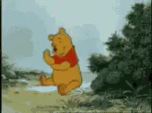 Winnie the Pooh sitting and smiling