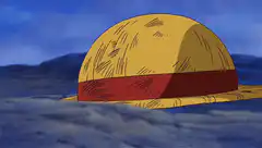 Luffy puts on his straw hat