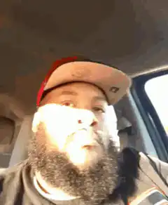 Man in car looking around