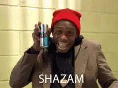 Man holding Red Bull can says Shazam