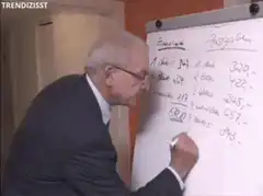 Man writing on whiteboard