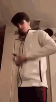 Person doing a card trick with a white card