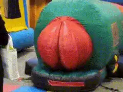 kid climbs into inflatable butt
