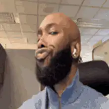 Man with beard making a funny face