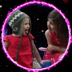 Two girls in a glowing pink circle