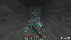 Minecraft player mining diamond ore