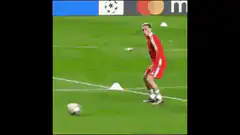soccer player dribbling past opponent