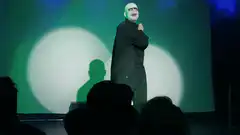 Drag queen performs on stage
