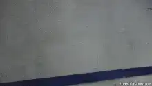 Man in suit emerges from smoke