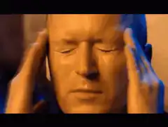 Man holding head in pain