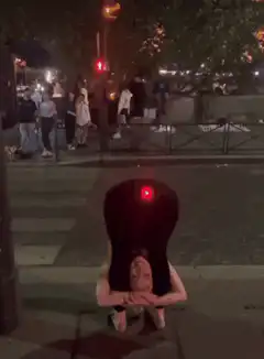 Woman headstand with traffic light