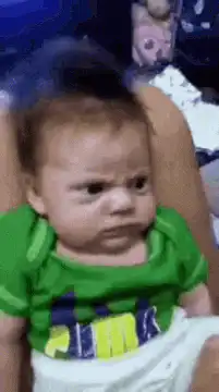 Baby gets cheeks squished